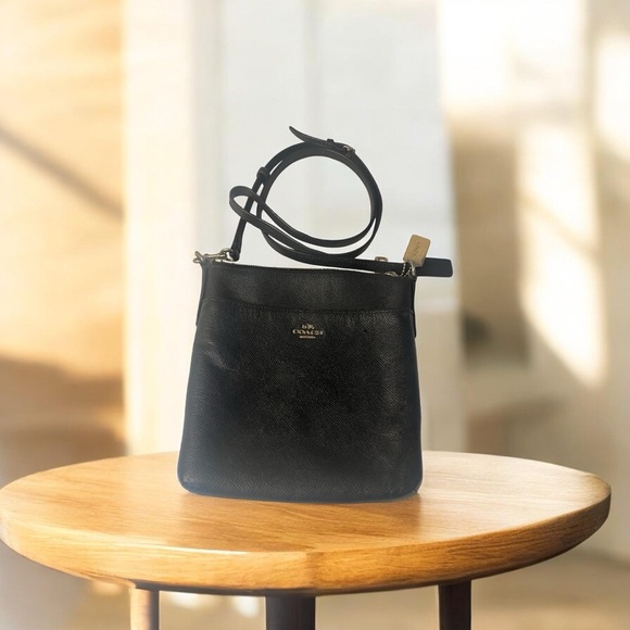 Coach Handbags - Coach Black Textured Leather Crossbody Bag With Gold Accents